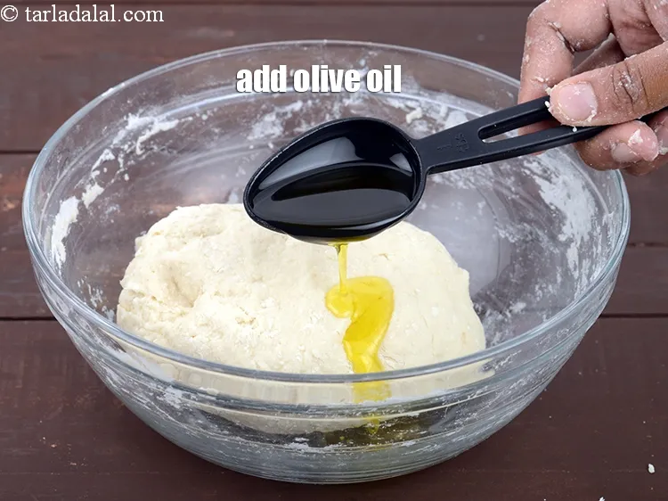 Step 13 – Add 1 tbsp <a href="https://www.tarladalal.com/glossary-olive-oil-451i">olive oil</a>.