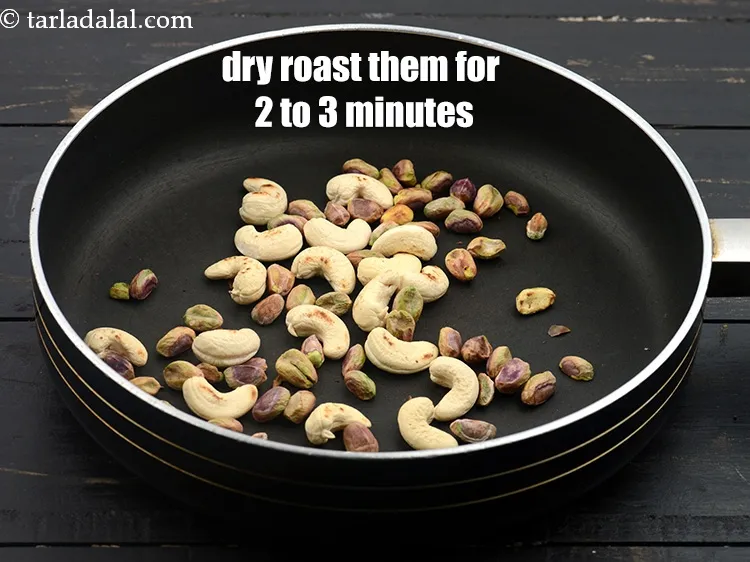 स्टेप 13 – पिस्ते और काजू को मध्यम आंच पर 2 से 3 …