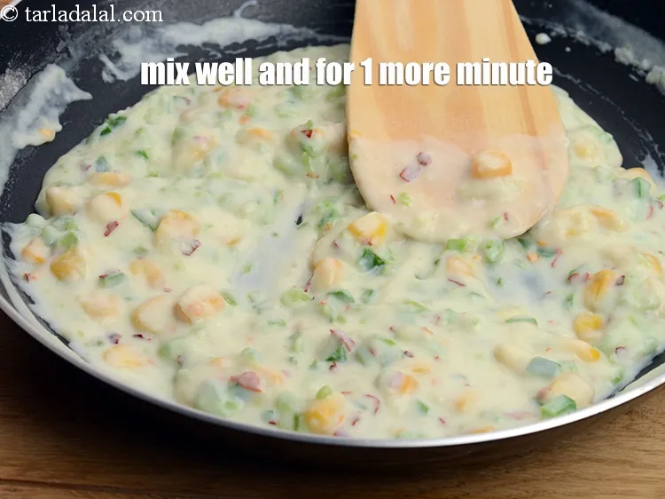 Step 13 – Mix well and cook on a medium flame for 1 more minute.