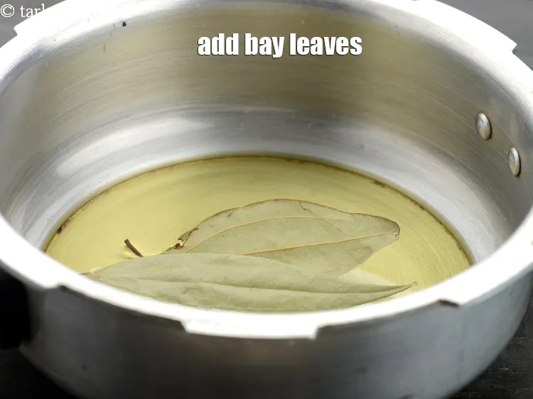 Step 18 – Add 2&nbsp;<a href="https://www.tarladalal.com/glossary-bay-leaf-tejpatta-bay-leaves-189i">bay leaves (tejpatta)</a>.
