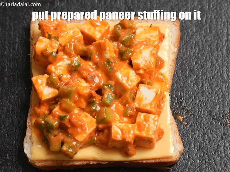 Step 13 – Put the prepared paneer stuffing on it.