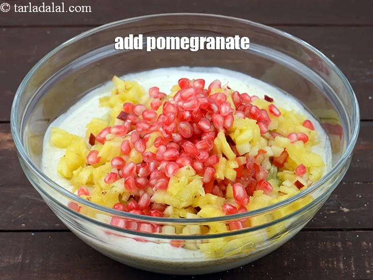 Step 18 – Add &frac14; cup <a href="https://www.tarladalal.com/glossary-pomegranate-anar-587i">pomegranate (anar)</a>.