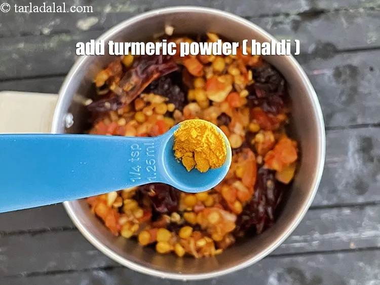 Step 42 – Add 1/8th tsp turmeric powder&nbsp;( haldi ).