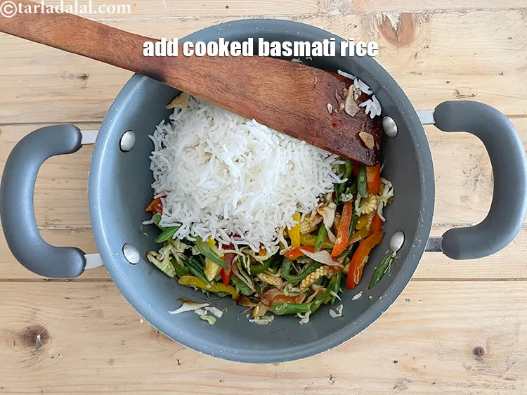 Step 17 – Add&nbsp;<meta charset="UTF-8" />3 cups&nbsp;<a href="cooked-long-grained-rice--basmati-22657r">cooked long grained rice (basmati</a>.