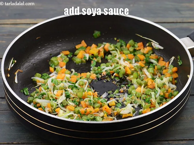 Step 23 – Add 2 tsp&nbsp;<a href="https://www.tarladalal.com/glossary-soy-sauce-soya-sauce-864i">soy sauce</a>.&nbsp;