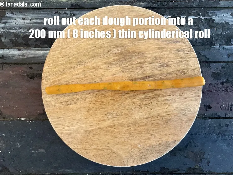 Step 13 – Roll each portion into a 200 mm. (8&quot;) long thin cylindrical roll. &nbsp;