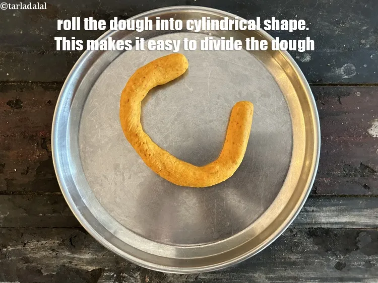 Step 13 – Roll the dough into cylinderical shape. This makes it easy to divide the dough.