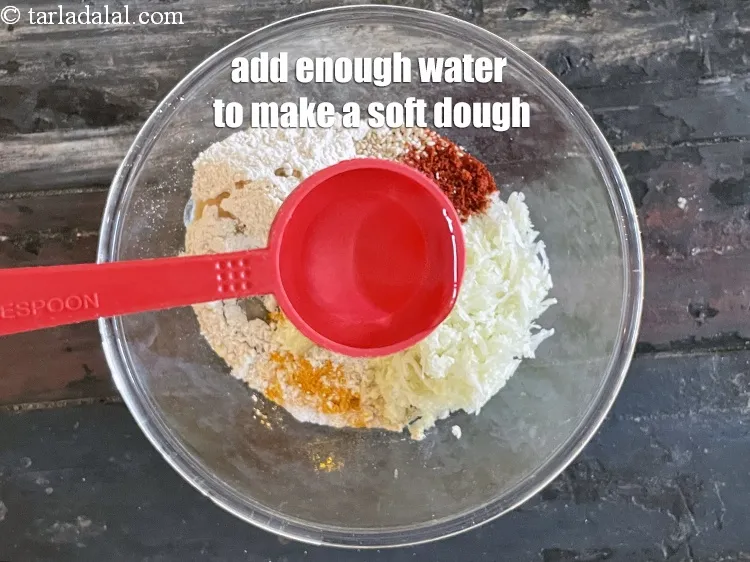 Step 14 – Add enough water to make a soft dough. We added 2 tablespoons&nbsp;water.