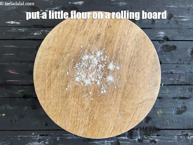 Step 14 – <meta charset="UTF-8" />Put a little flour on the rolling board.&nbsp;&nbsp;<br /> &nbsp;