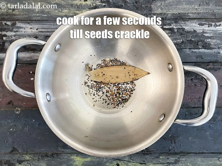 Step 21 – Cook for a few seconds and let the seeds crackle.
