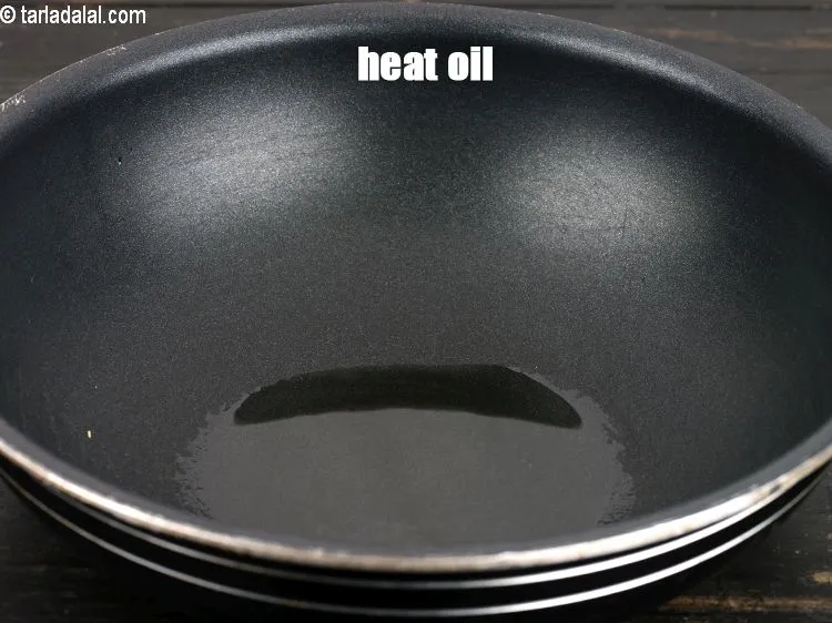 Step 13 – To make <strong>rajma saagwala</strong>, heat 1 &frac12; tsp of oil.