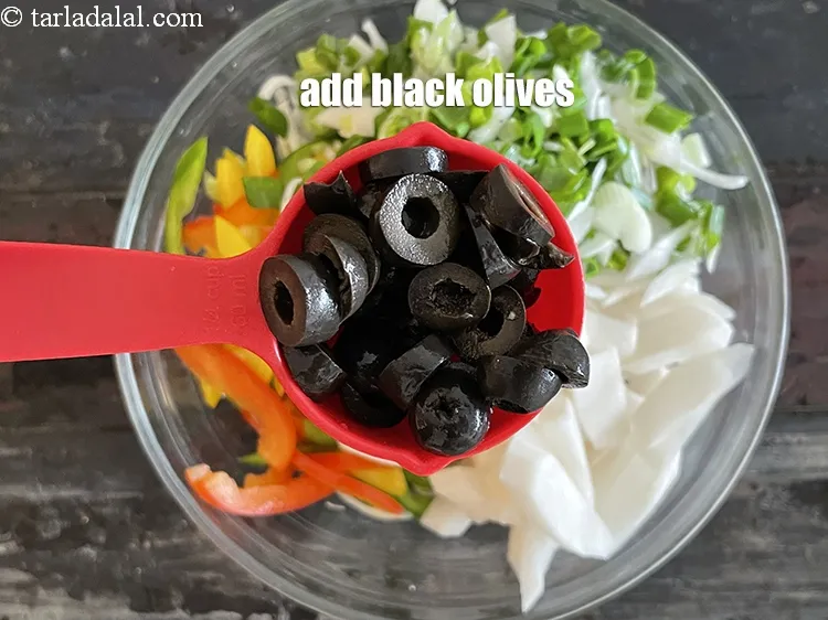 Step 18 – Add&nbsp;<meta charset="UTF-8" />1/4 cup&nbsp;<a href="glossary-black-olives-kale-jaitun-449i">black olives</a>&nbsp;(optional).