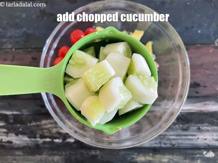Step 21 – Add&nbsp;1/2 cup&nbsp;<a href="https://tarladalal.com/glossary-chopped-cucumber-795i">chopped cucumber</a>.