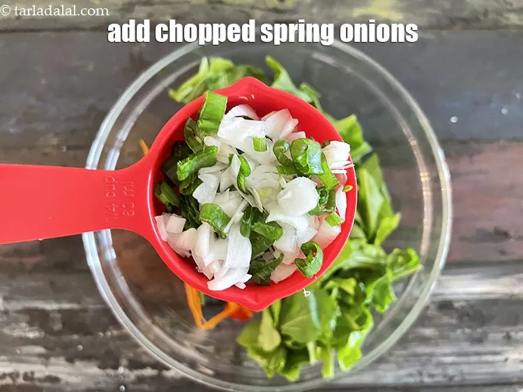 Step 24 – Add&nbsp;1/4 cup&nbsp;<a href="glossary-chopped-spring-onions-1575i">chopped spring onions</a>.
