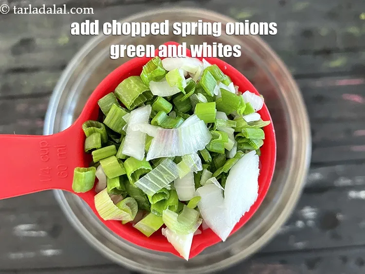 Step 22 – Add&nbsp;<meta charset="UTF-8" />3 tbsp&nbsp;finely&nbsp;chopped spring onions, whites and green.