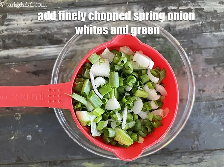 Step 18 – Add&nbsp;<meta charset="UTF-8" />3/4 cup&nbsp;finely&nbsp;<a href="glossary-chopped-spring-onions-1575i">chopped spring onions</a>&nbsp;(whites and greens).