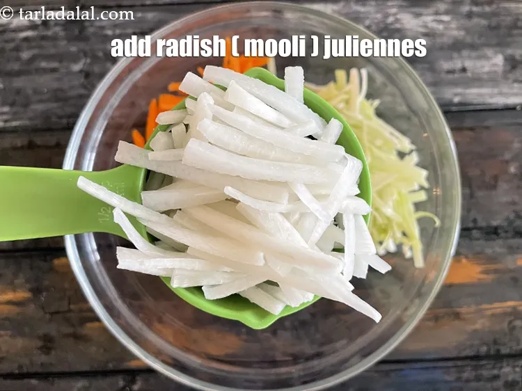 Step 15 – Add&nbsp;<!--%3Cmeta%20charset%3D%22UTF-8%22%20%2F%3E-->1/2 cup&nbsp;white&nbsp;<a href="https://www.tarladalal.com/glossary-radish-julliennes-951i">radish juliennes</a>.