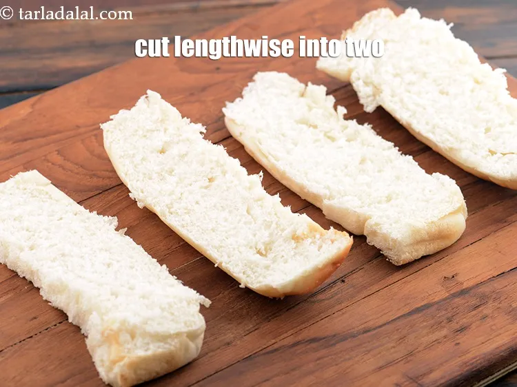 Step 14 – Cut each hot dog roll lengthwise into two using a sharp knife.&nbsp;