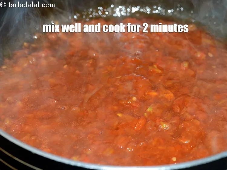 Step 13 – Mix well and cook on a medium flame for 2 minutes, while stirring occasionally.