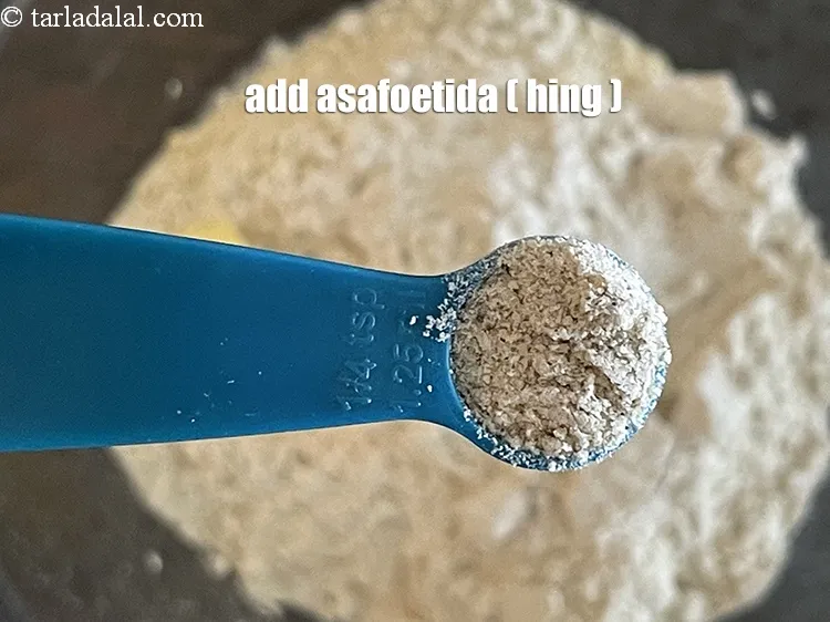 Step 13 – Add&nbsp;<meta charset="UTF-8" />1/4 tsp&nbsp;<a href="glossary-asafoetida-hing-113i">asafoetida (hing)</a>.