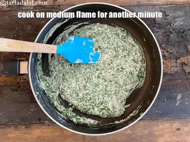 Step 26 – Cook on a medium flame for another minute.&nbsp;