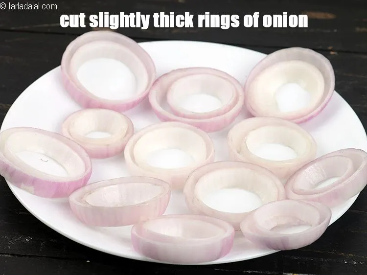 Step 14 – To make <strong>cheese onion rings</strong>, cut slightly thick rings of onion. Make a pair of …