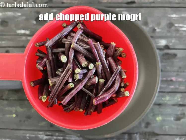 Step 13 – Add&nbsp;<meta charset="UTF-8" />30 <a href="glossary-purple-radish-pods-purple-mogri-2702i">purple radish pods (mogri)</a>, chopped to one inch pieces, washed and …