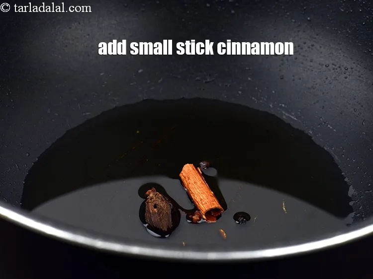 Step 14 – Add 1&nbsp;small stick&nbsp;<a href="https://www.tarladalal.com/glossary-cinnamon-dalchini-346i">cinnamon (dalchini)</a>.