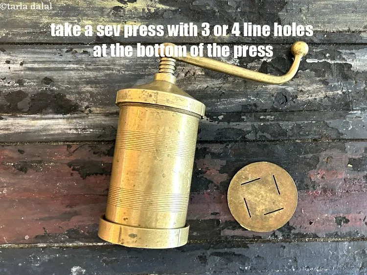 Step 14 – <html><head><meta charset="UTF-8"> </head><body><p>Take a&nbsp;“sev press”, fit the mold with these sized holes ( the ones …