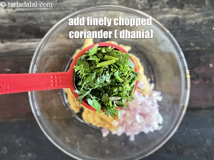 Step 20 – Add&nbsp;<meta charset="UTF-8" />2 tbsp&nbsp;finely&nbsp;<a href="glossary-chopped-coriander-783i">chopped coriander (dhania)</a>.