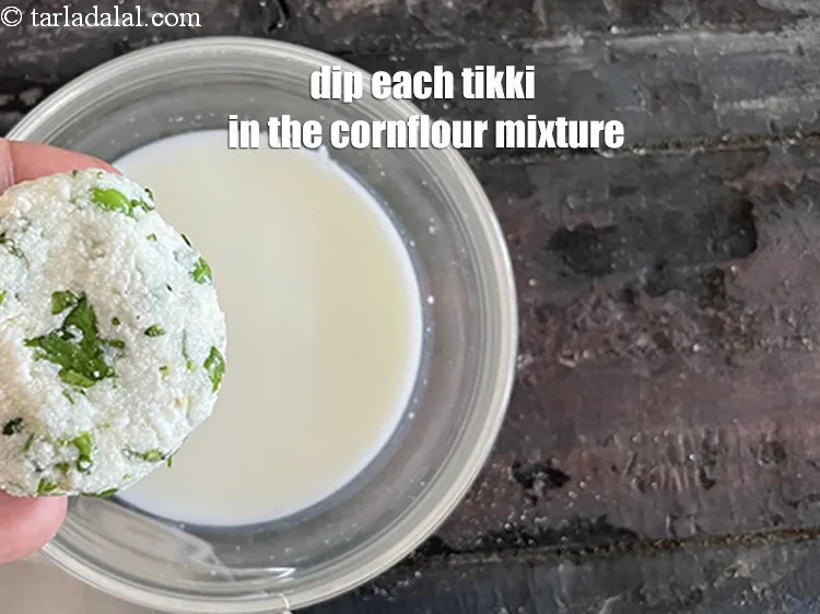 Step 15 – Dip each tikki in cornflour mixture.