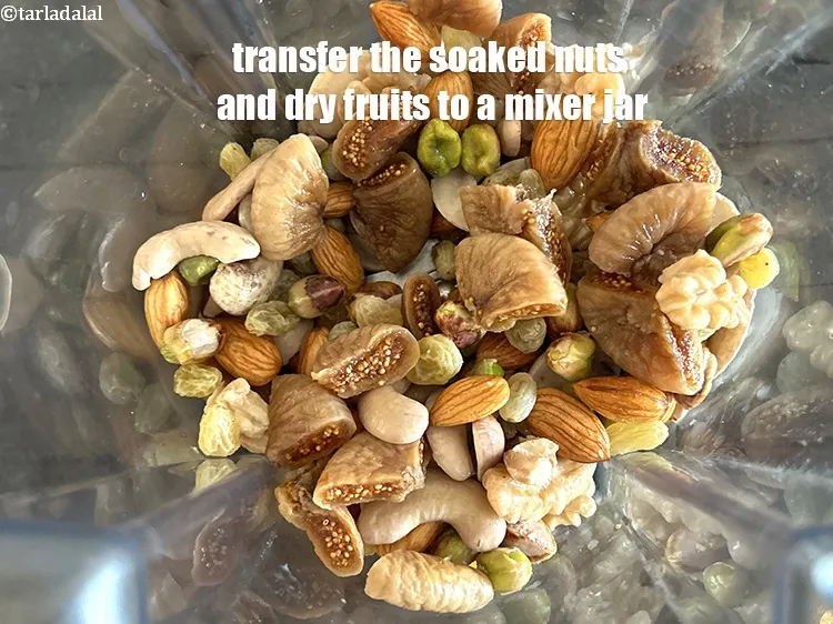 Step 13 – <html><head><meta charset="UTF-8"></head><body><p>Transfer the soaked mixed nuts to a mixer jar.&nbsp;</p></body></html>