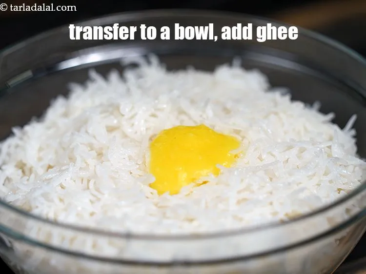 Step 14 – Transfer to a deep bowl, add 1&nbsp;tbsp&nbsp;<a href="https://www.tarladalal.com/glossary-ghee-245i">ghee</a>.&nbsp;