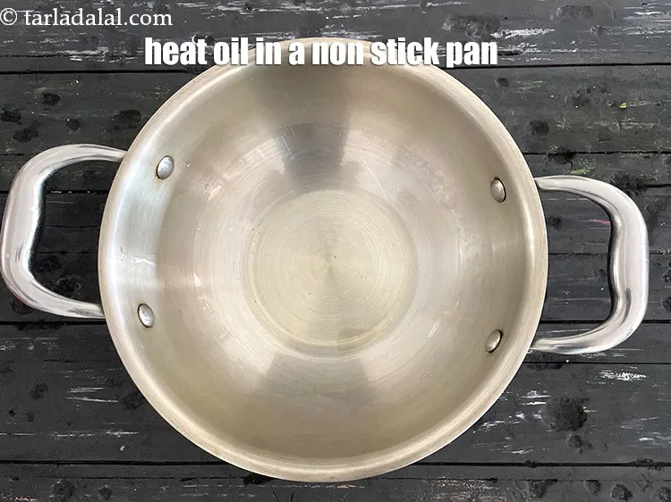 Step 13 – To make <strong>Malvani vatana usal recipe | kala vatana usal |&nbsp;Malvani vatana gravy |&nbsp;</strong>heat 1/2 …