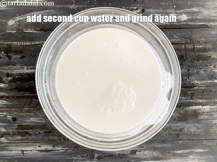 Step 14 – Add another cup of left over water and grind again. Pour batter into a bowl.