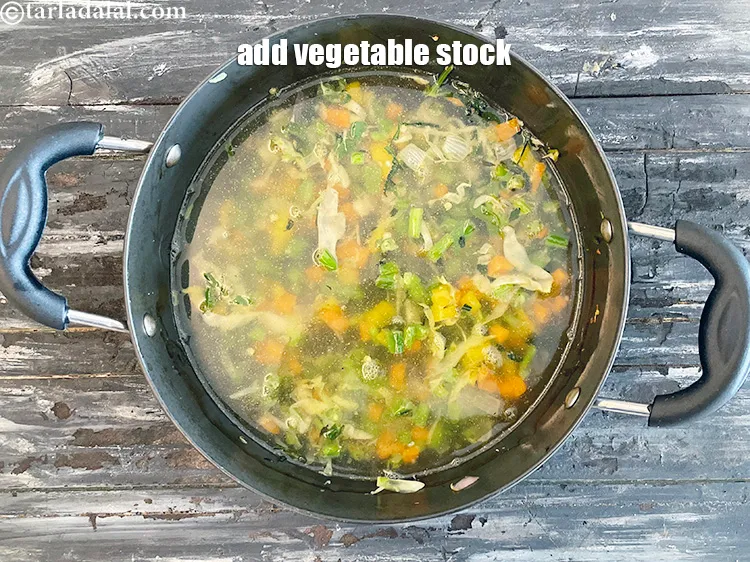 Step 25 – Add&nbsp;<meta charset="UTF-8" />4 cups&nbsp;<a href="vegetable-stock-38556r">vegetable stock</a>.