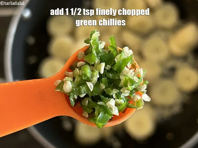Step 20 – Add&nbsp;<meta charset="UTF-8" /><strong>1 1/2 tsp&nbsp;</strong>finely&nbsp;<a href="glossary-chopped-green-chilli-820i">chopped green chillies</a>.