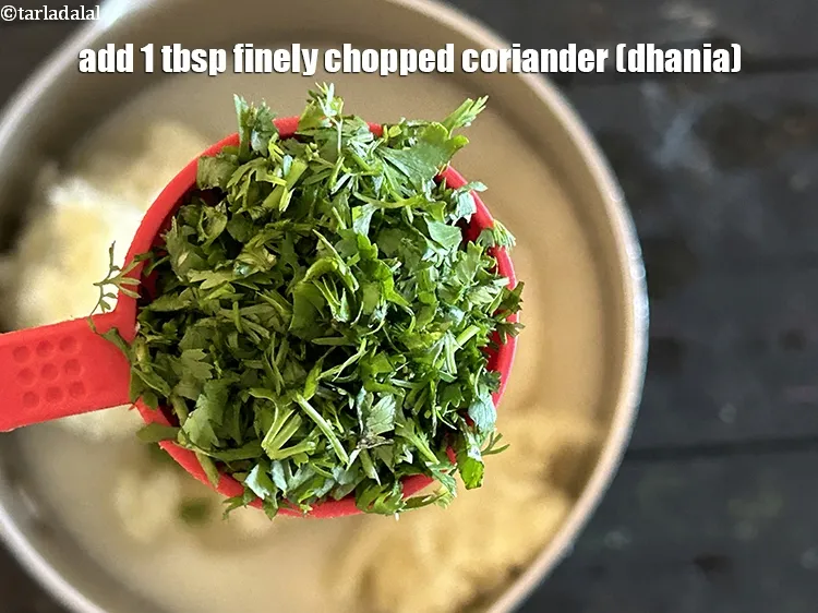 Step 15 – Add&nbsp;<meta charset="UTF-8" />1 tbsp&nbsp;finely&nbsp;<a href="glossary-chopped-coriander-783i">chopped coriander (dhania)</a>.