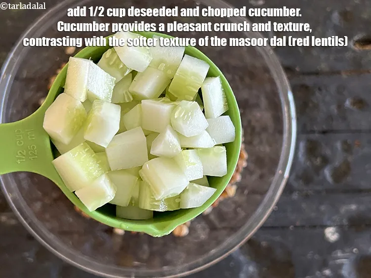 Step 21 – <html><head></head><body><p>Add&nbsp;1/2 cup&nbsp;deseeded and&nbsp;<a href="glossary-chopped-cucumber-795i">chopped cucumber</a>.&nbsp;Cucumber provides a pleasant crunch and texture,&nbsp;contrasting with the softer texture …