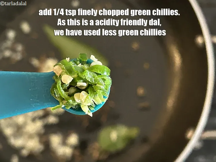 Step 32 – <meta charset="UTF-8" />Add&nbsp;1/4 tsp&nbsp;finely&nbsp;<a href="glossary-chopped-green-chilli-820i">chopped green chillies</a>.&nbsp;<strong>As this is a acidity friendly dal, we have …