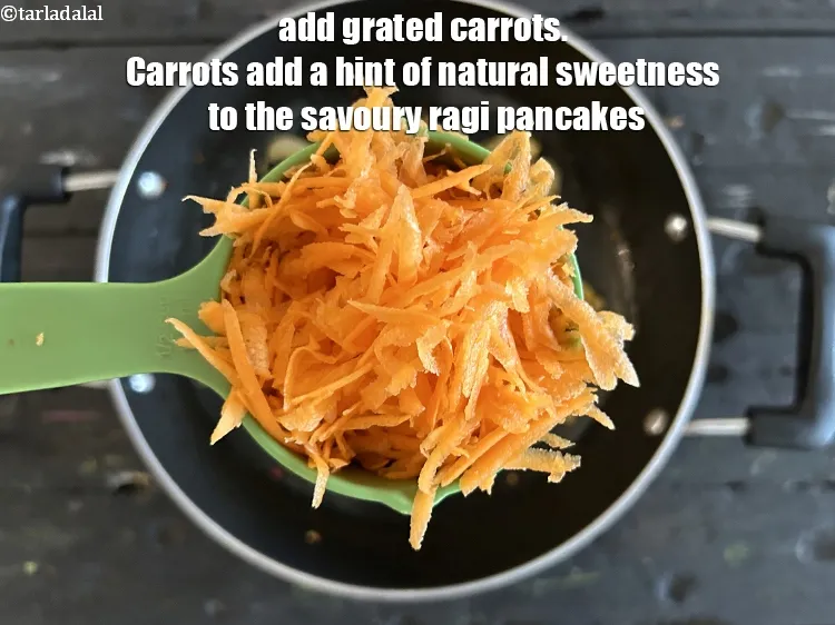 Step 14 – Add&nbsp;1/2 cup&nbsp;<a href="https://www.tarladalal.com/glossary-grated-carrot-816i">grated carrot</a>.&nbsp;Carrots add a hint of natural sweetness to the savory ragi batter …