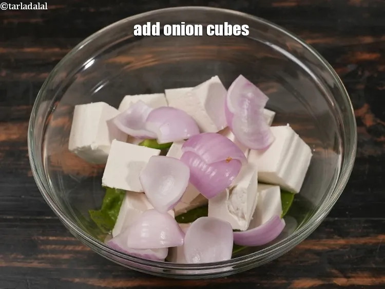 Step 14 – Add&nbsp;1/2&nbsp;cup&nbsp;<a href="https://www.tarladalal.com/glossary-onion-cubes-732i">onion cubes</a>.