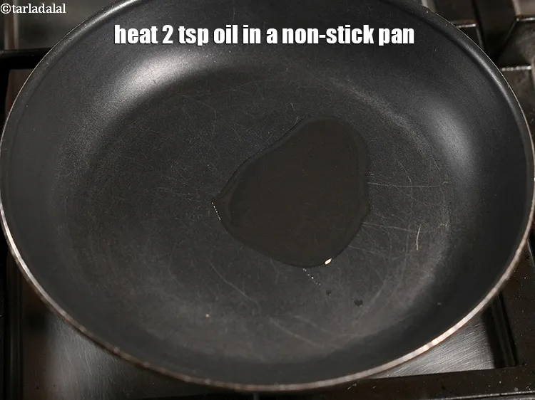 Step 14 – Heat 2 tsp oil in a non-stick pan.