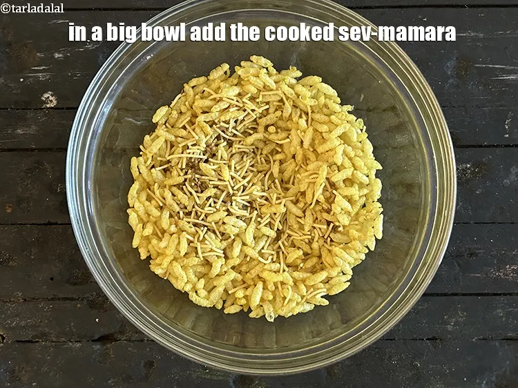 Step 16 – In a big bowl add the cooked sev-mamara.