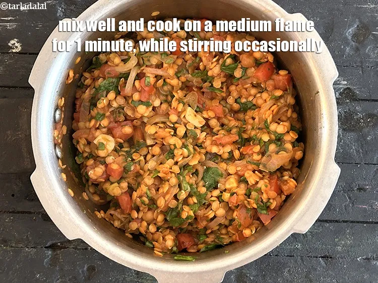 Step 14 – Mix well and cook on a medium flame for 1 minute, while stirring occasionally.