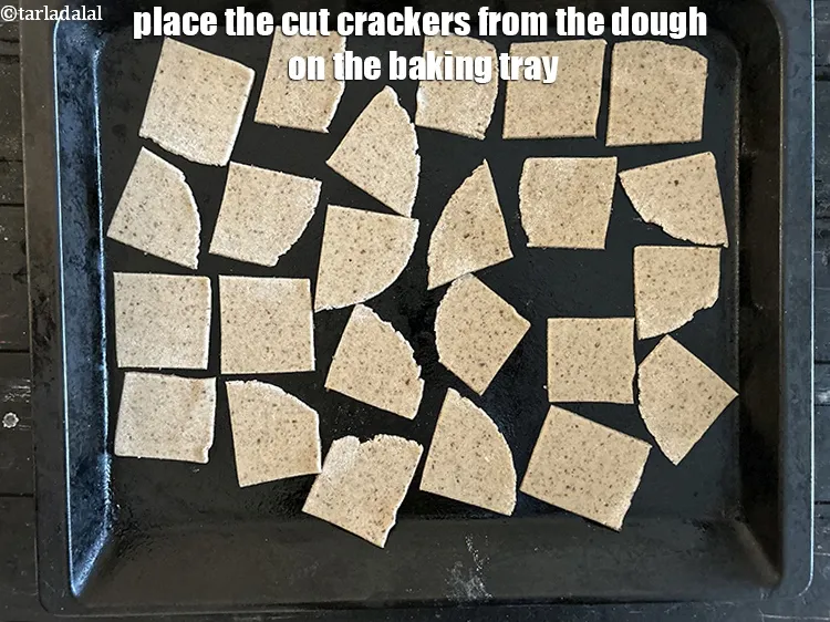 Step 15 – Place the cut crackers from the dough on the baking tray.<br /> &nbsp;