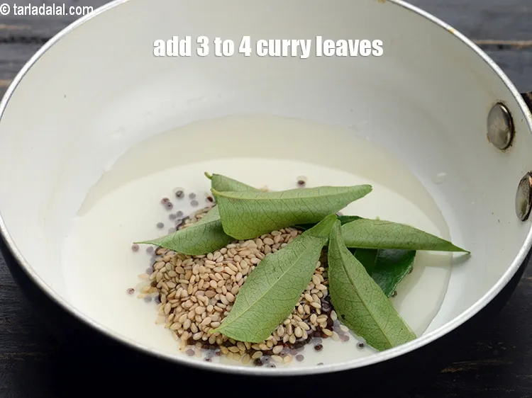 Step 14 – Add 3 to 4 curry leaves.
