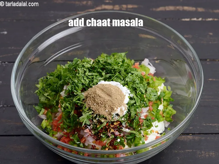 Step 14 – Add &frac12; tsp <a href="https://www.tarladalal.com/glossary-chaat-masala-300i">chaat masala</a>.
