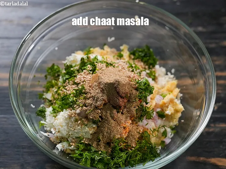 Step 14 – Add &frac12; tsp <a href="https://www.tarladalal.com/glossary-chaat-masala-300i">chaat masala</a>.