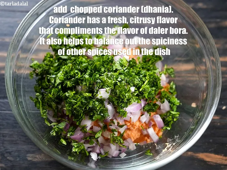 Step 13 – Add &frac14; cup finely <a href="https://www.tarladalal.com/glossary-chopped-coriander-783i">chopped coriander (dhania)</a>.&nbsp;Coriander has a fresh, citrusy flavor that complements …